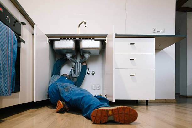 Professional Drain Cleaning technician working in Waterford, WI